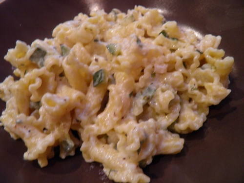 courgettes,chèvre frais,corolles d'alsace,pâtes,ail,origan,vin blanc sec,crème,thym,piment d'espelette, parmesan