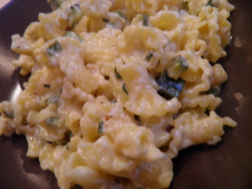 courgettes,chèvre frais,corolles d'alsace,pâtes,ail,origan,vin blanc sec,crème,thym,piment d'espelette, parmesan