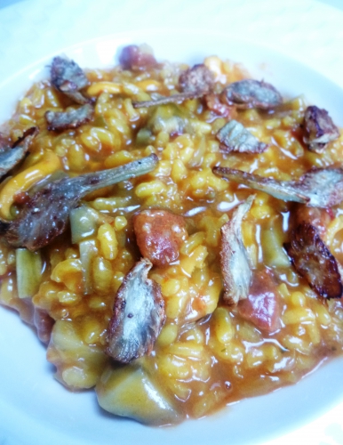 bouillon de moules otero,bouillon de volaille,riz arborio,artichauts,citron,echalote,vin blanc sec,beurre,huile d'olive,parmesan,ail,vinaigre de vin,moules,piquillos,chorizo