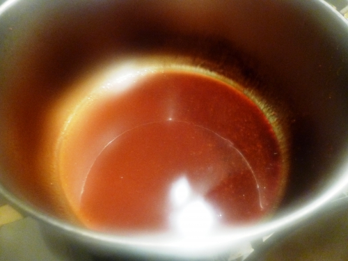 os et parures d'agneau,fond d'agneau,carottes,oignons,romarin,thym,laurier,persil,echalotes,ail,tomates,riz à risotto,arborio,carnarolli,vin blanc,bouillon de volaille,parmesan,beurre,vinaigre de vin rouge,citron,artichauts,poireau,céleri,jambon de bayonne,zeste d'orange,coriandre,barigoule,huile d'arachide