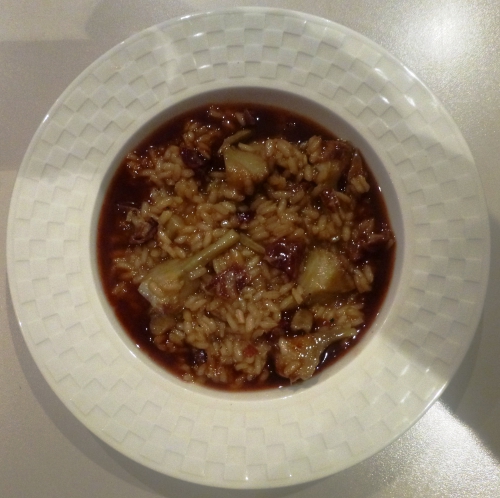 os et parures d'agneau,fond d'agneau,carottes,oignons,romarin,thym,laurier,persil,echalotes,ail,tomates,riz à risotto,arborio,carnarolli,vin blanc,bouillon de volaille,parmesan,beurre,vinaigre de vin rouge,citron,artichauts,poireau,céleri,jambon de bayonne,zeste d'orange,coriandre,barigoule,huile d'arachide