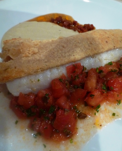 cocos de paimpol,bouillon de volaille,girofle,oignon blanc,poireau,céleri vert,crème,ail,romarin,noisettes,comté,panko,pignons,beurre,merlu,gros sel de guerande,thym; fleur de sel aux poivres du monde,jus de volaille,vinaigre de xères,chorizo,citron,tomates,persil,basilic,coriandre,olives noires,piment d'espelette,coriandre en poudre