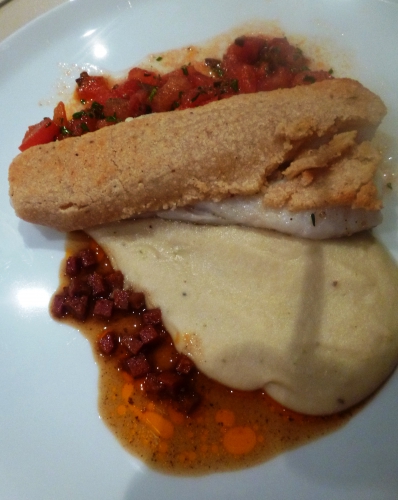 cocos de paimpol,bouillon de volaille,girofle,oignon blanc,poireau,céleri vert,crème,ail,romarin,noisettes,comté,panko,pignons,beurre,merlu,gros sel de guerande,thym; fleur de sel aux poivres du monde,jus de volaille,vinaigre de xères,chorizo,citron,tomates,persil,basilic,coriandre,olives noires,piment d'espelette,coriandre en poudre